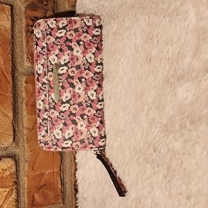 Steve Madden Wallet Floral Inside card holders and zippered pocket.